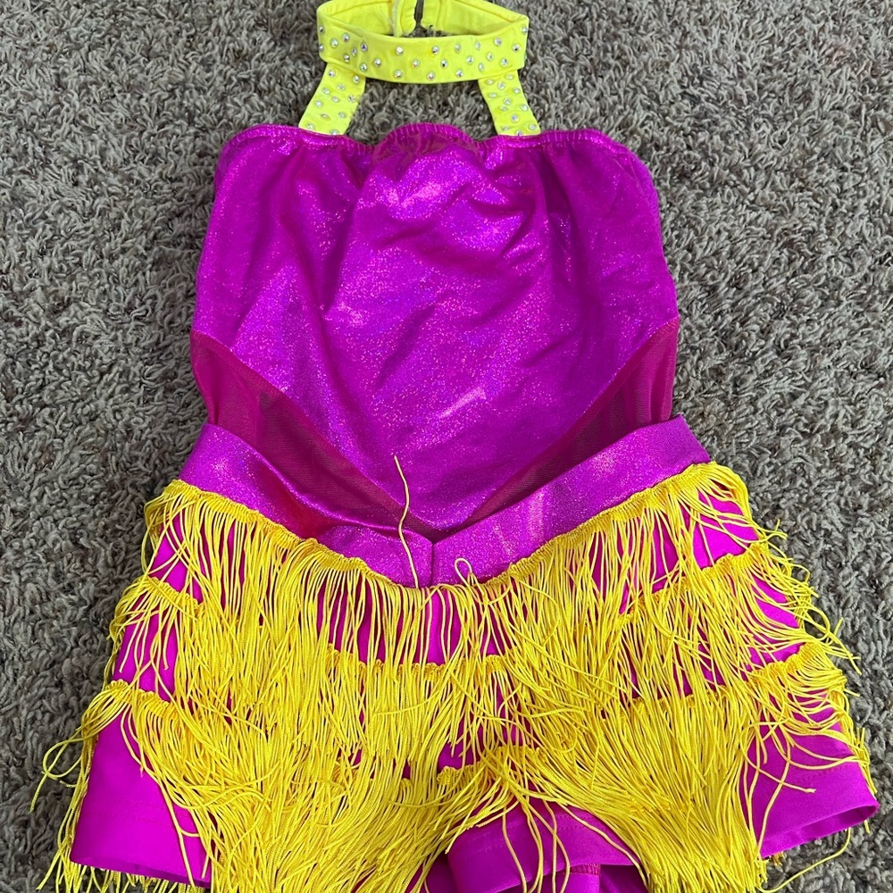 Yellow and pink costume with yellow fringe and clear rhinestones
